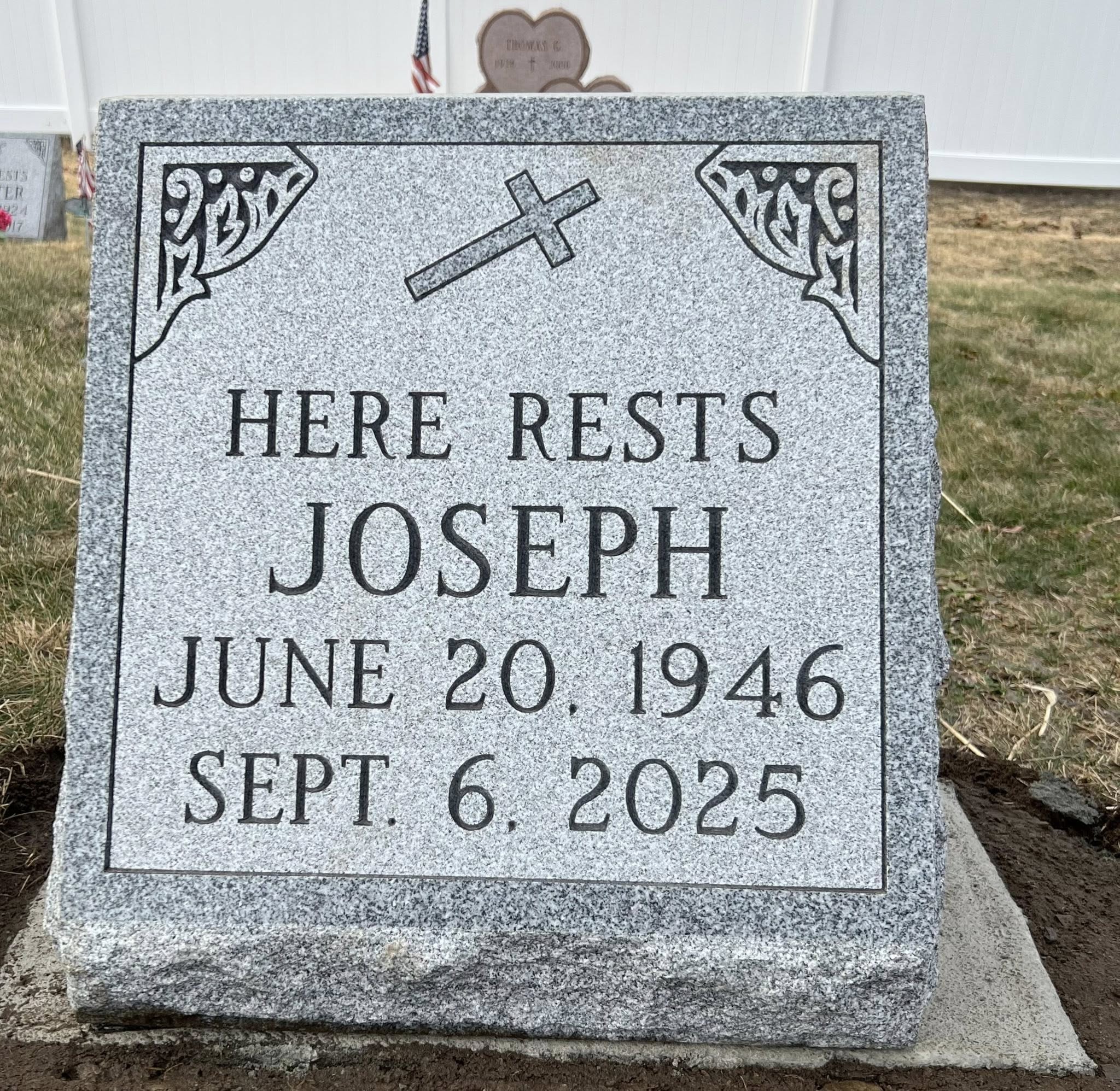 A finished upright monument installed in the cemetery by Snyder Granite