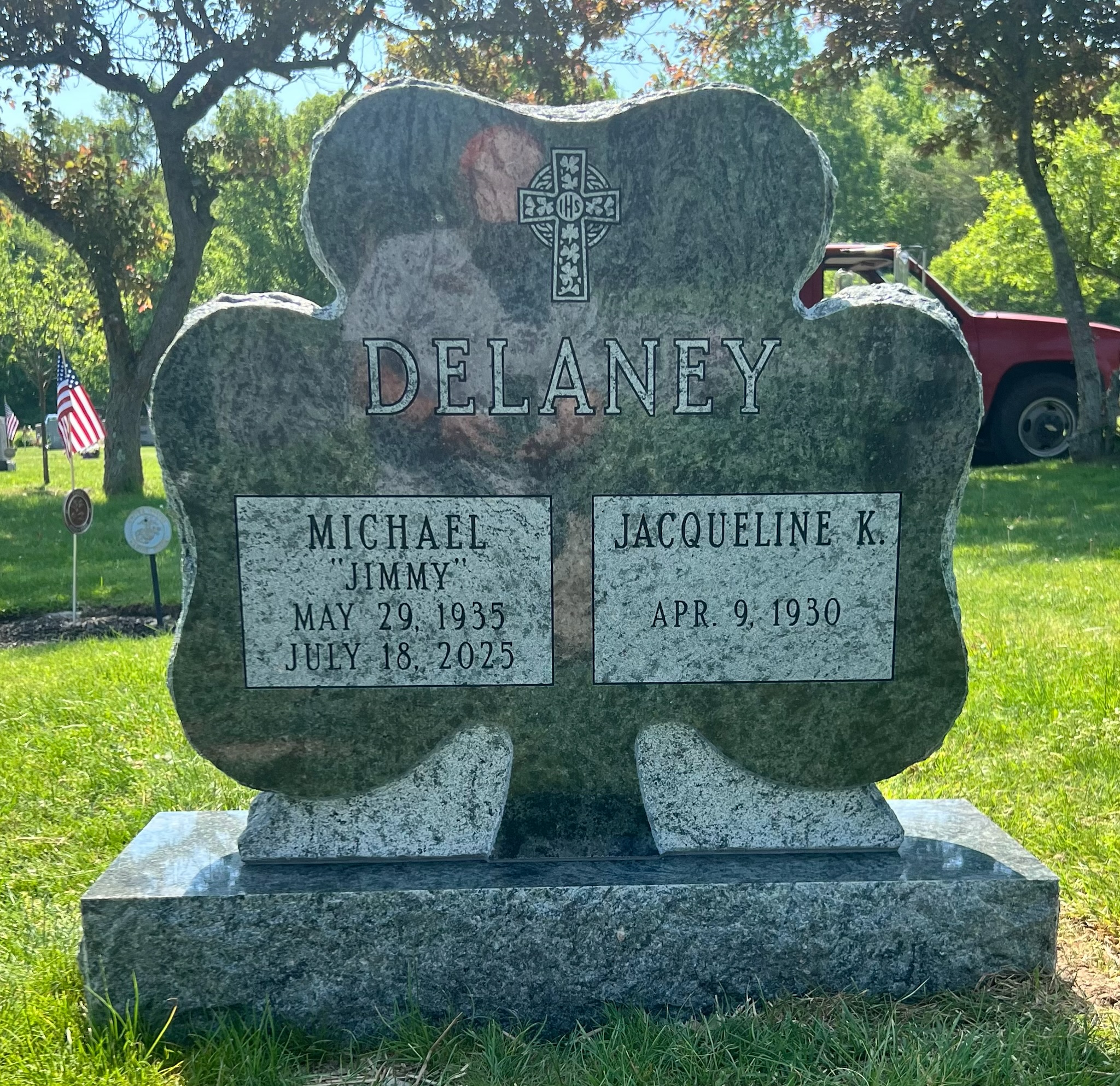 Delaney monument with shamrock carving